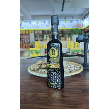 Botella pequeña de 220 ml de licor de jengibre.