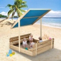 Sandpit exterior con cubierta ajustable para la playa.