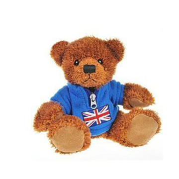 Stuffed teddy bear with an American flag T-shirt