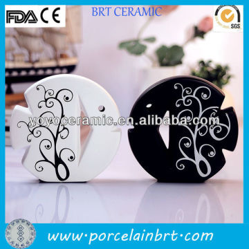white and black fish shaped ceramic fish wedding decorations