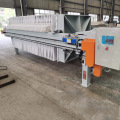 Hydraulic compacting membrane filter press