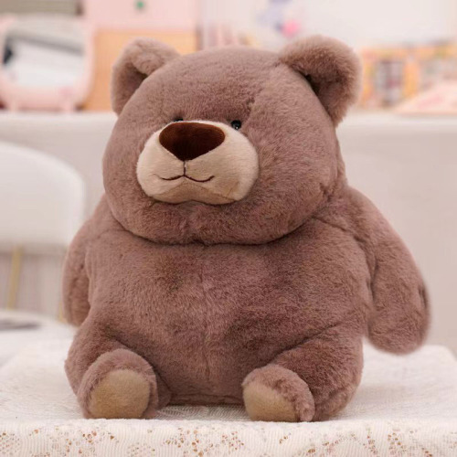 Chubby sitting little brown bear stuffed animal