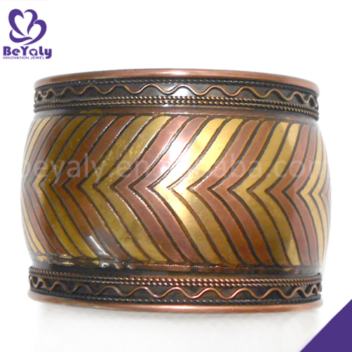 Popular wide arrows design copper bangle
