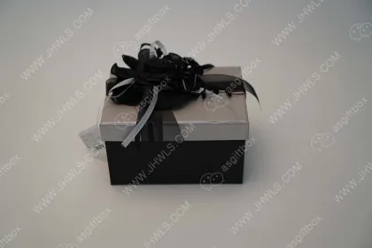 A modest ribbon flower gift box