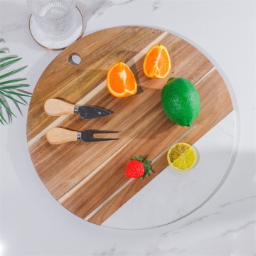 Circular Hanging Perforated Design: A Stylish and Functional Marble and Wood Splicing Dual-Purpose Cutting Board