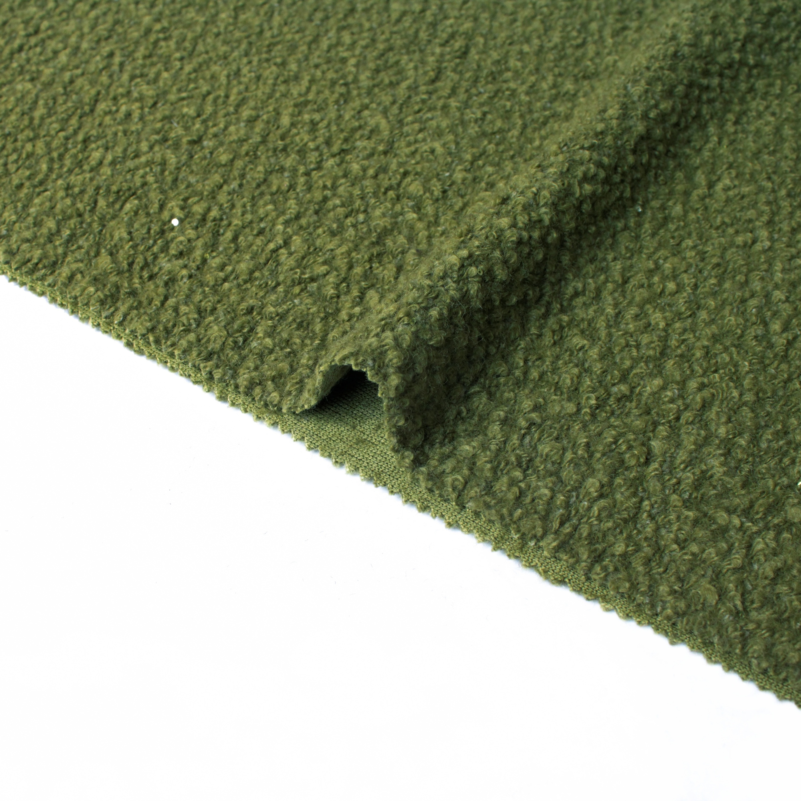 Mossy Green Sparkle သည်သိုးမွှေးရောနှောထည်ဖြစ်သည်