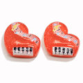 Fornitura di colori assortiti Resina Cuore adorabile Note di pianoforte Ciondoli posteriori piatti Cabochons artigianali fai-da-te per bambini Accessorio per album