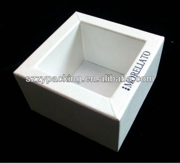 white cardboard watch box without lid