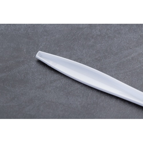 Білі пластикові ножі виделки ложки столові прибори партії