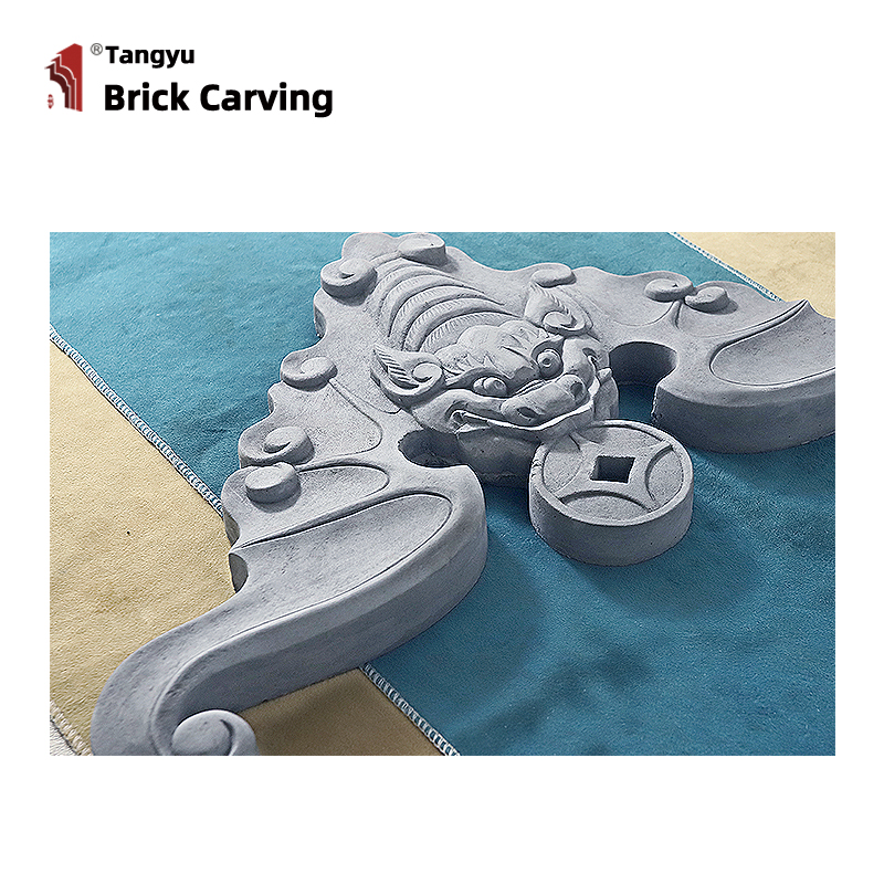Carved bats in triangular grey tiles