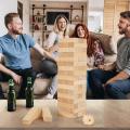 Riesiges Taumelholzspielzeug Holzblock-Stapel-Spiel