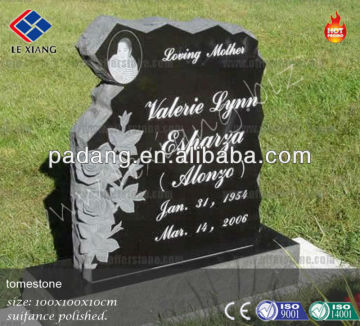 Black marble tombstone