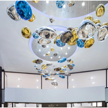 Large shaped glass chandelier in the hotel lobby