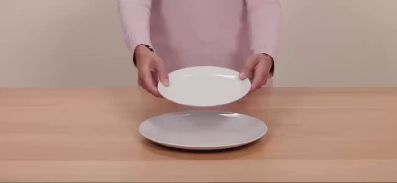 18 - Piece White Dinnerware Set, Including Plates and Bowls, for 6 People.