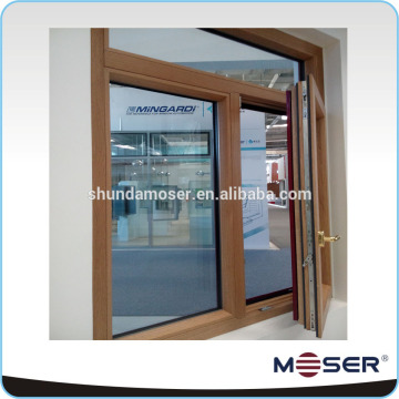 German style wood window grill with open turn and tilt pane