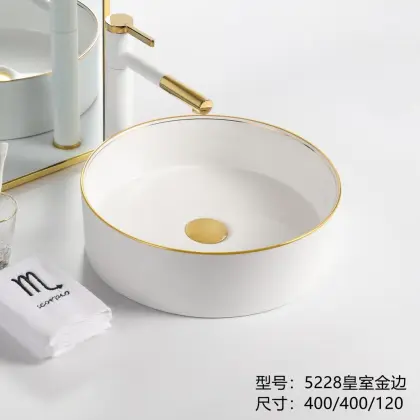 Gold above counter wash basin