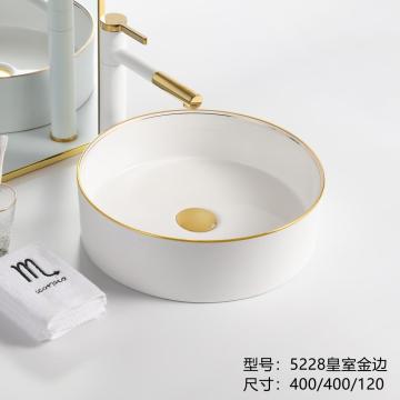 Gold above counter wash basin