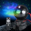 Proyector de luz nocturna de astronautas y lámpara de sala de juegos
