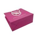 Luxus -Logo Custom Glossy Pink Geschenkpapierbeutel