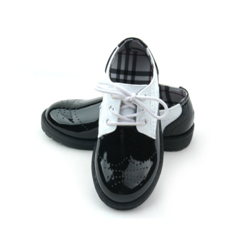 Zapatos casuales para niños en blanco y negro de cuero de Quanlity