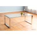 Mesa de café de vidrio minimalista con patas de acero inoxidable