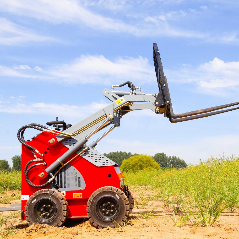 Grader attachment for small wheeled skid steer loaders