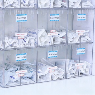 Dispensador de seringa de cima para baixo
