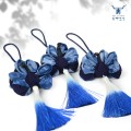 Bolsita étnica con colgante de borla de pavo real de algodón tie-dye