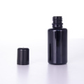 Round Shoulder Glass Bottles With Smooth Black Caps