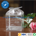 Kotak plastik bening transparan dengan gantungan bunga