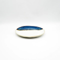 Elegant blauw en wit reactief glazuur steengoed met een dessertplaat