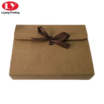 Kraft paper envelope with ribbon closure