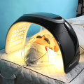 Máscara profesional de terapia de luz LED de 7 colores con spray hidratante, función UV, terapia de calor y EMS