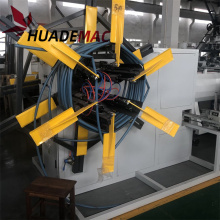 Plastic pipe coil winding machine