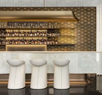 Modern light luxury style bar counter with metal background wall