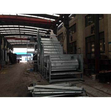 Inclined type slat conveyor