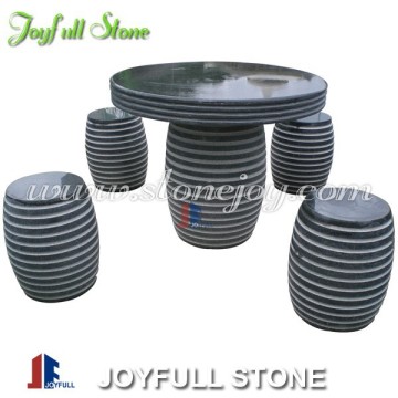 Outdoor garden stone tables and benches