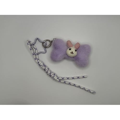 Adorable llavero de felpa con lazo y diseño suave y esponjoso.