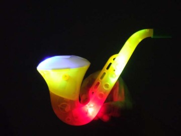 Saxophone Blowing Bubble With Light and Music