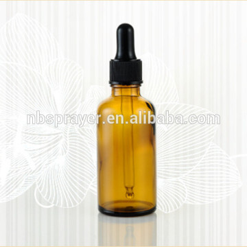 glass bottle with black rubber head used for cosmetic oil, olive oil glass bottle