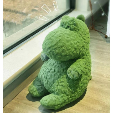 Small green dinosaur stuffed plush toy