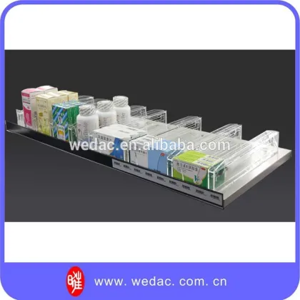 Self-dispensing shelves for use in displaying and dispensing products in supermarket