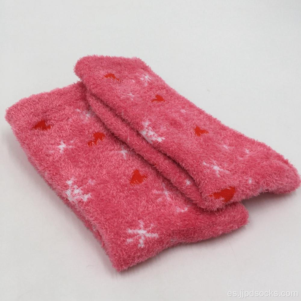 Calcetines acogedores de invierno de nieve rosa