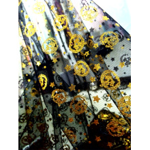 Foil tulle mesh fabric with a printed design