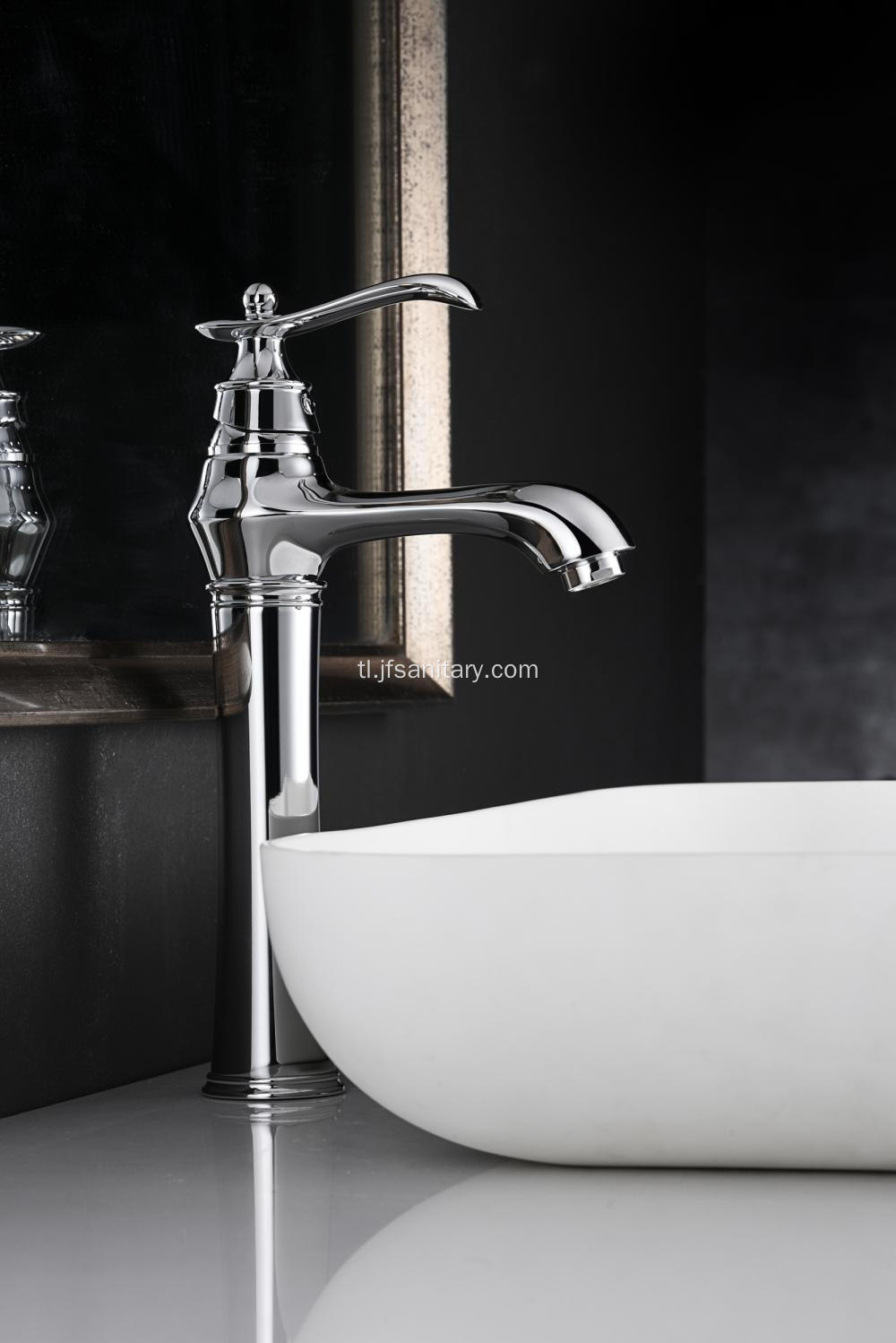 Chrome single pever vintage basin faucet tall.
