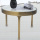 table basse ronde moderne en acier inoxydable