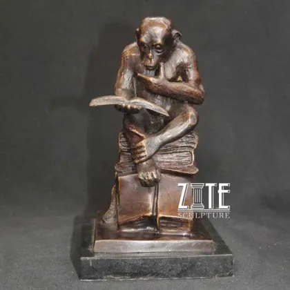 Custom metal bronze monkey reading book statue
