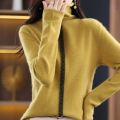 Woolen knit pullover with hem and pile neck