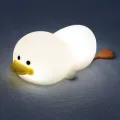 La luz nocturna encantadora en forma de pato mejora el espacio del sueño de los niños