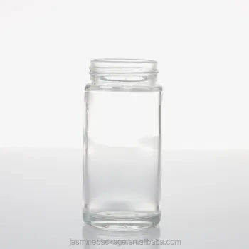 Factory Sale Glass Honey Bottles with Screw Cap - Tiny Handle Flat Oval Beeswax Shape" 

However, considering the exact shape mentioned, a more accurate title would be:

"Factory Sale Glass Honey Bottles in Honeycomb Shape with Screw Cap